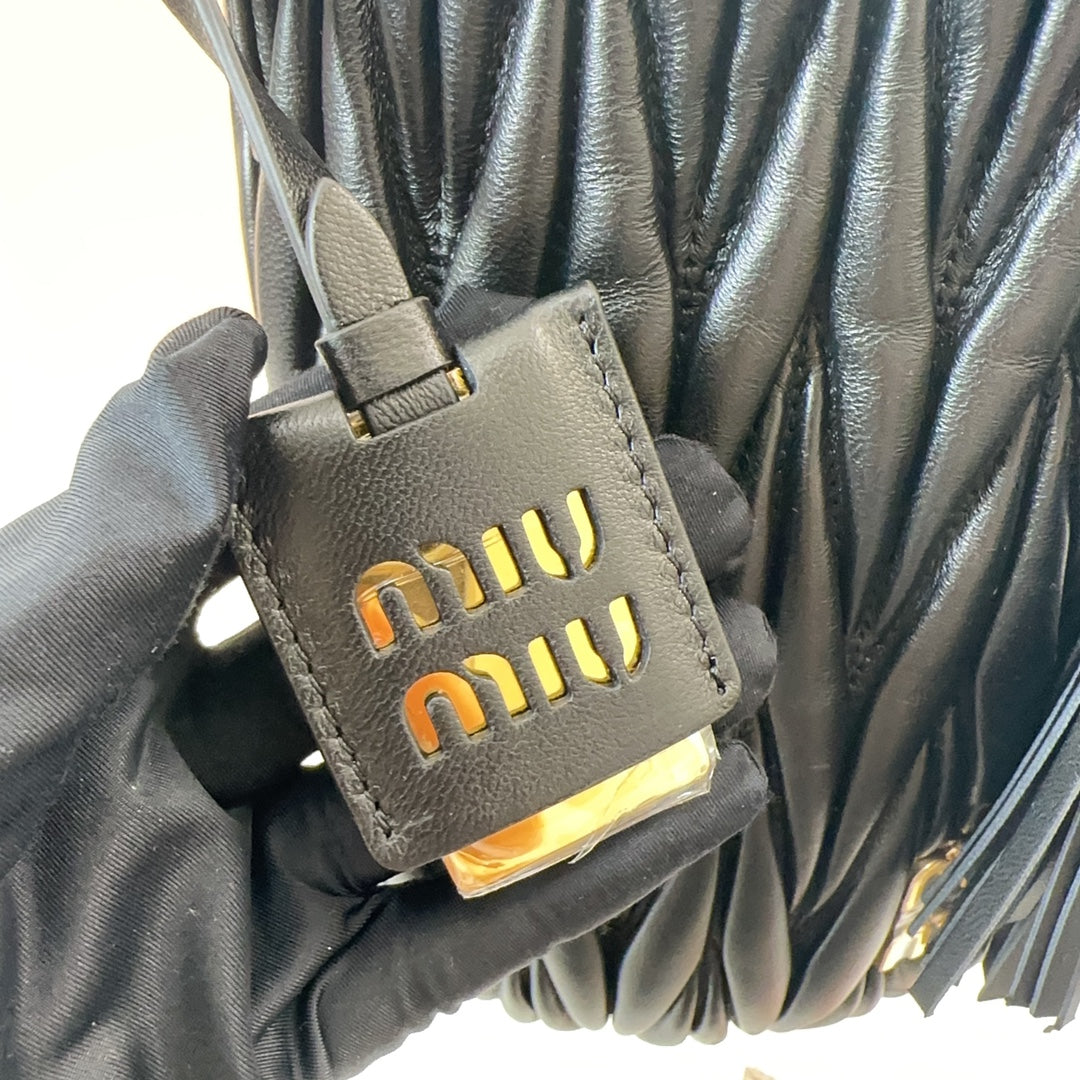 Miu Miu Pocket Matelassé Drawstring Bag – Black