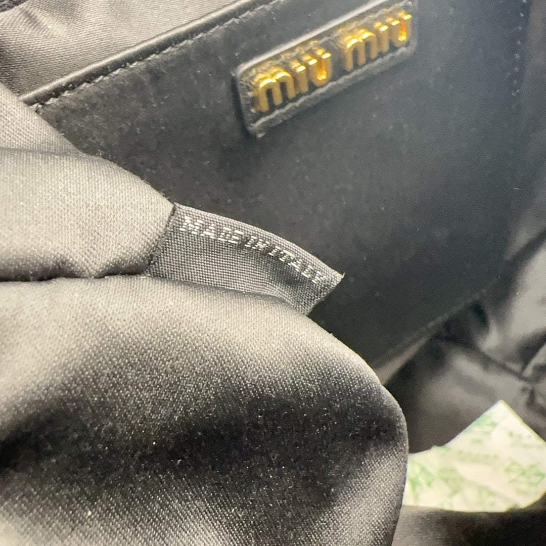 Miu Miu Pocket Matelassé Drawstring Bag – Black