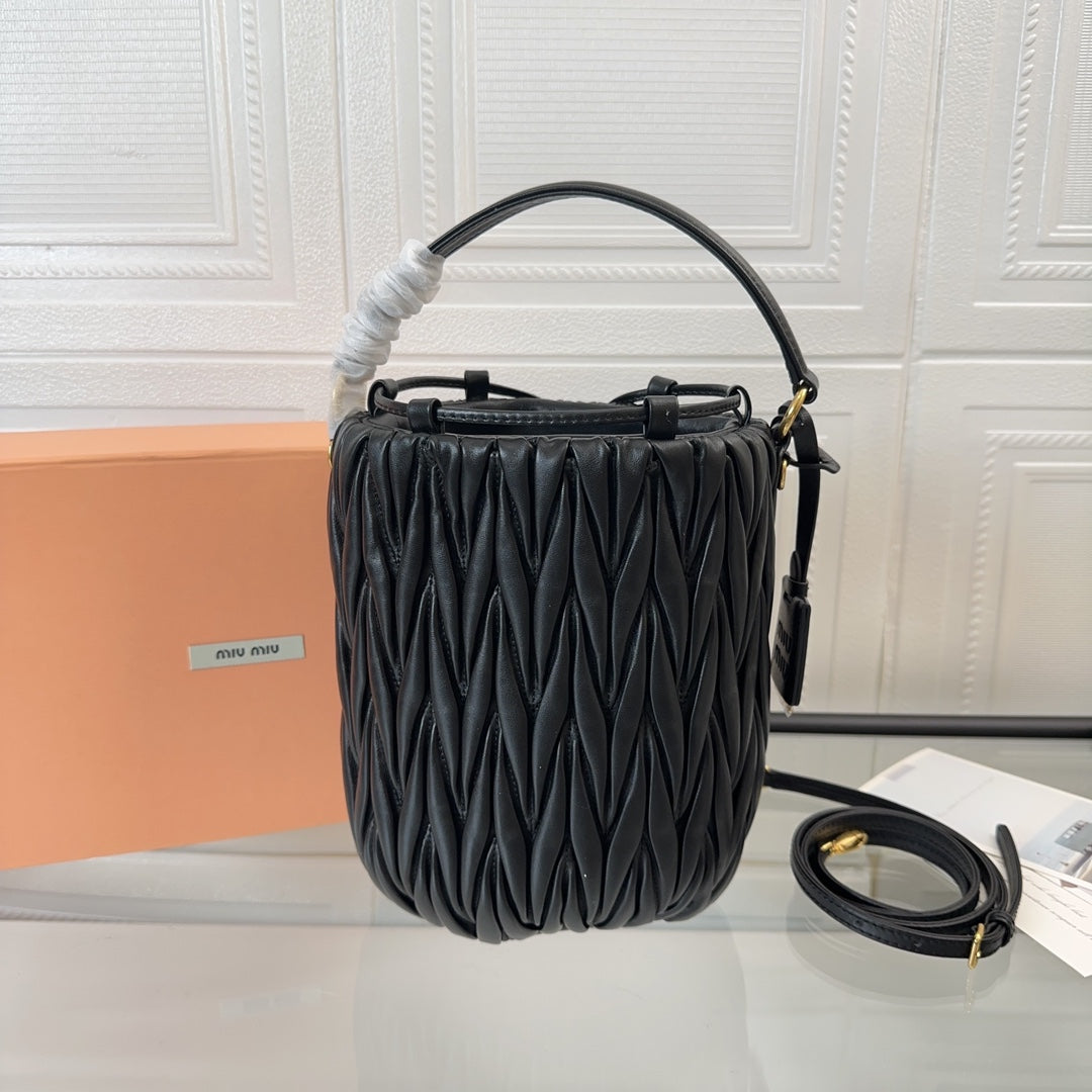 Miu Miu Pocket Matelassé Drawstring Bag – Black