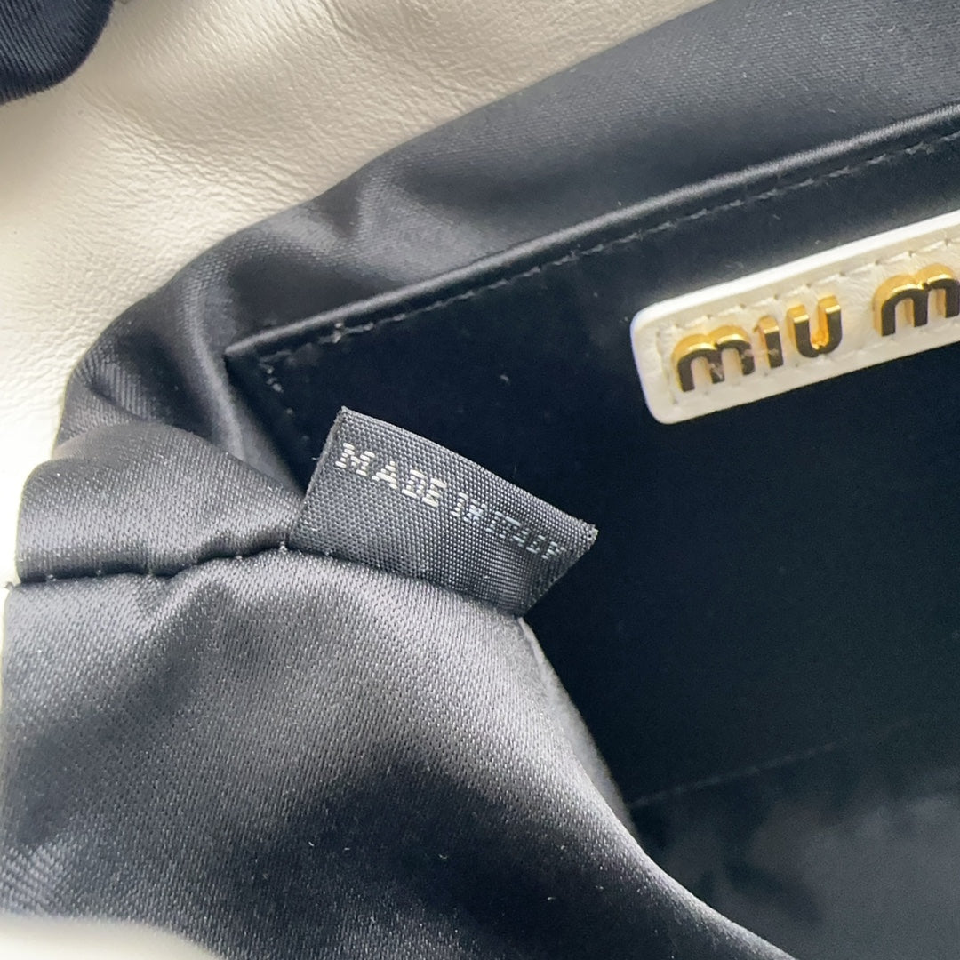 Miu Miu Pocket Matelassé Drawstring Bag – White
