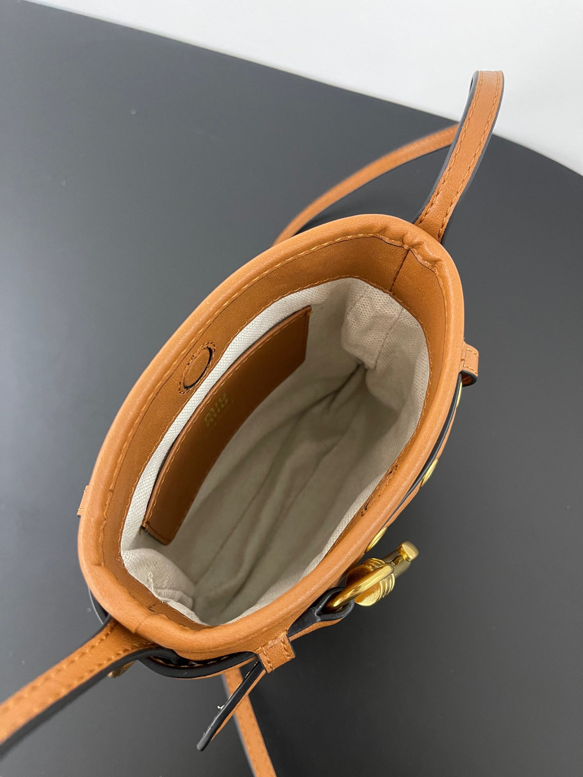 Miu Miu Aventure Leather Bucket Bag – Cognac