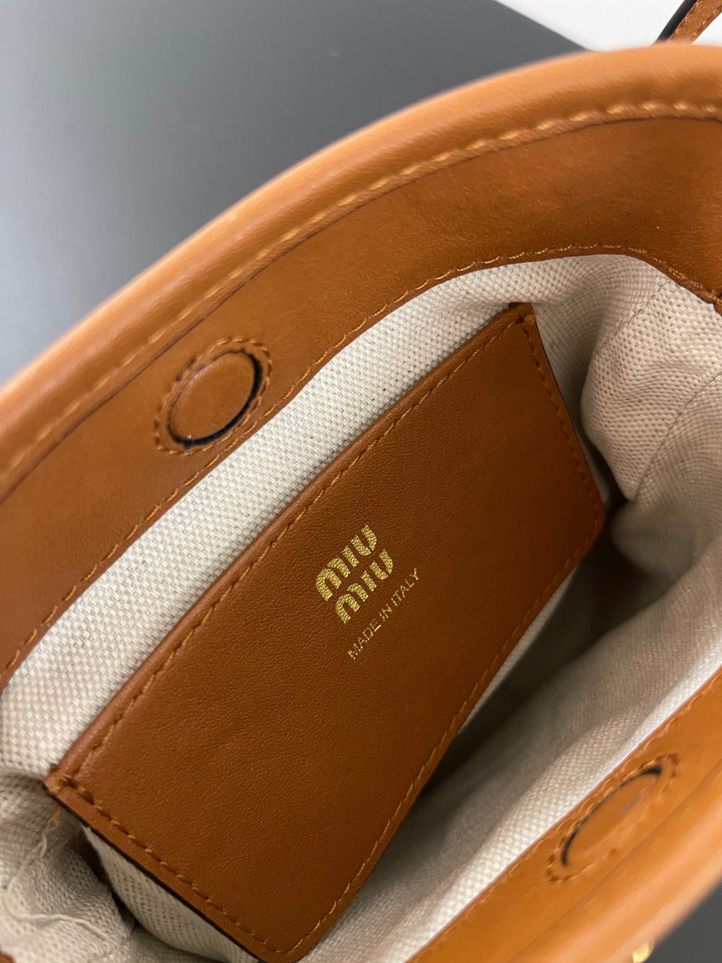 Miu Miu Aventure Leather Bucket Bag – Cognac