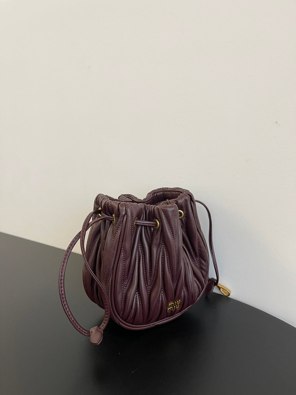 Miu Miu Matelassé Drawstring Mini Bag – Burgundy