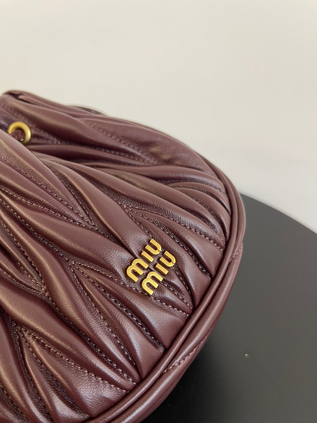 Miu Miu Matelassé Drawstring Mini Bag – Burgundy