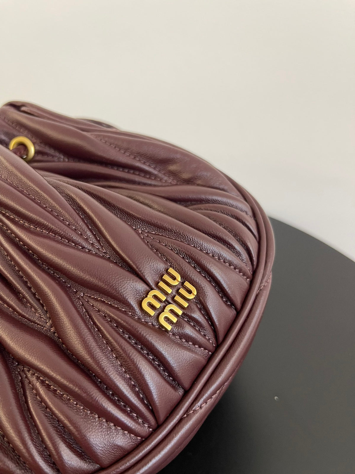 Miu Miu Matelassé Drawstring Mini Bag – Burgundy