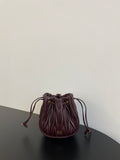 Miu Miu Matelassé Drawstring Mini Bag – Burgundy