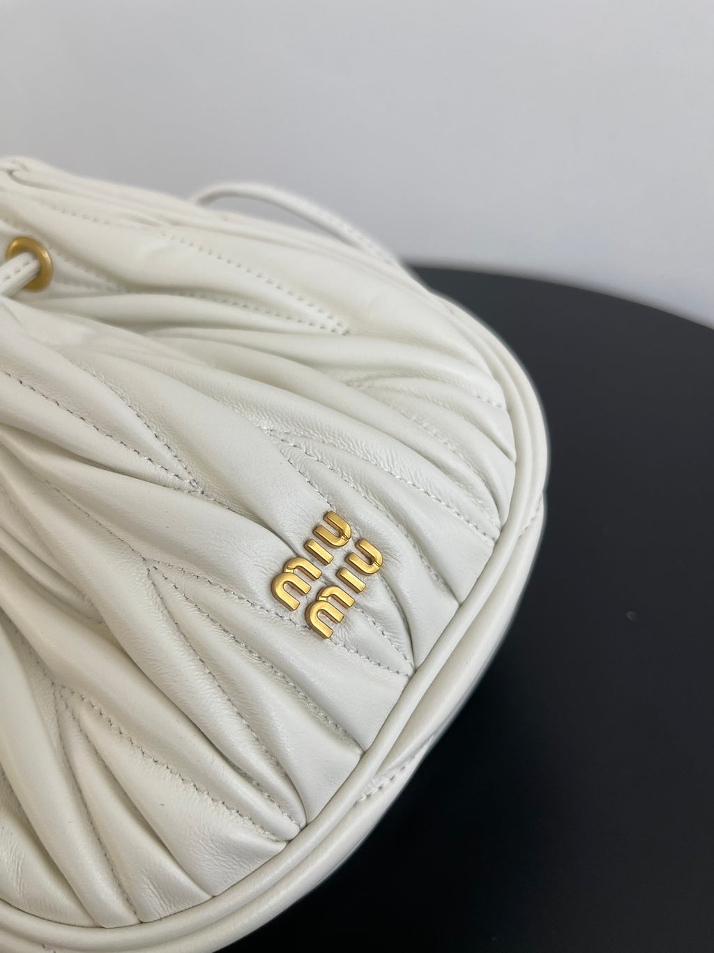 Miu Miu Matelassé Drawstring Mini Bag – White