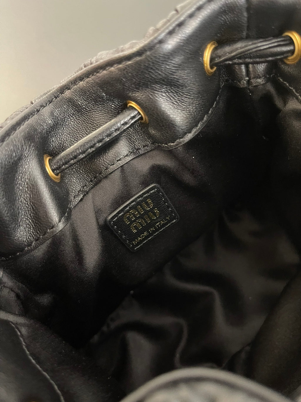 Miu Miu Matelassé Drawstring Mini Bag – Black