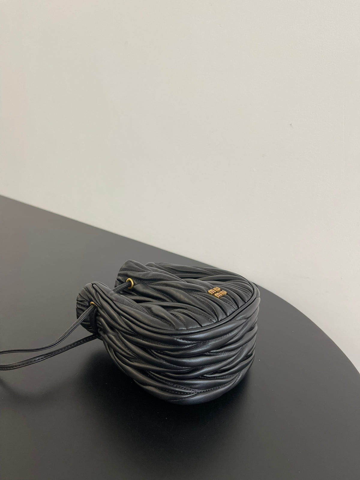 Miu Miu Matelassé Drawstring Mini Bag – Black