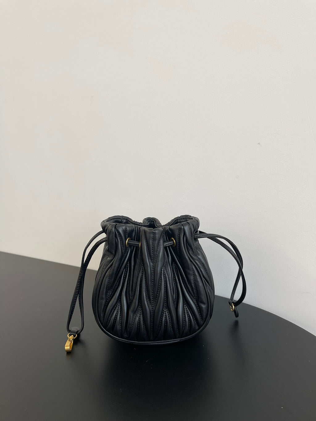 Miu Miu Matelassé Drawstring Mini Bag – Black