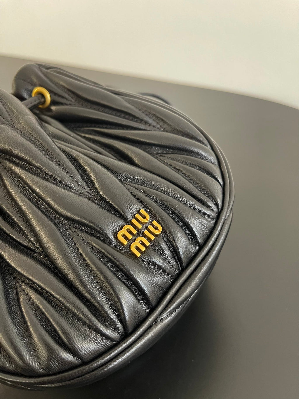 Miu Miu Matelassé Drawstring Mini Bag – Black