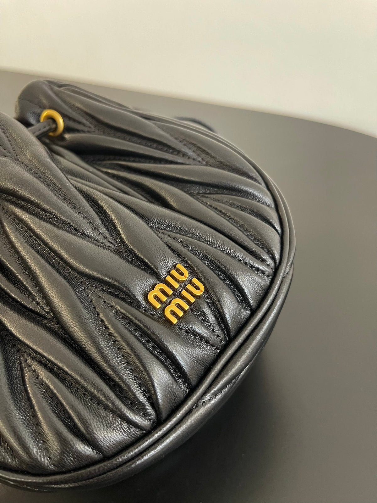 Miu Miu Matelassé Drawstring Mini Bag – Black