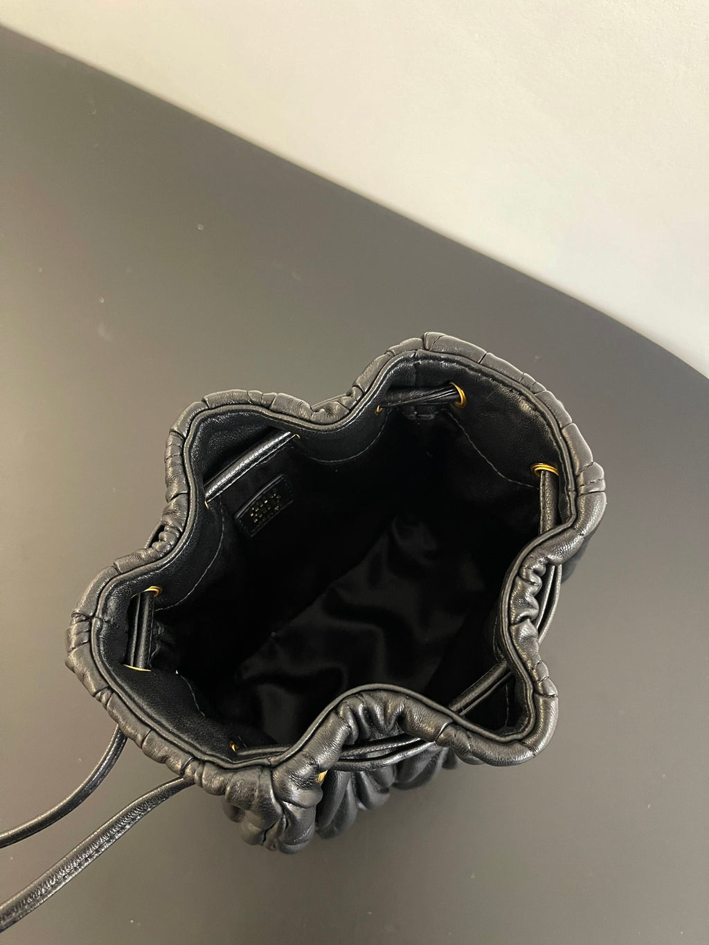 Miu Miu Matelassé Drawstring Mini Bag – Black