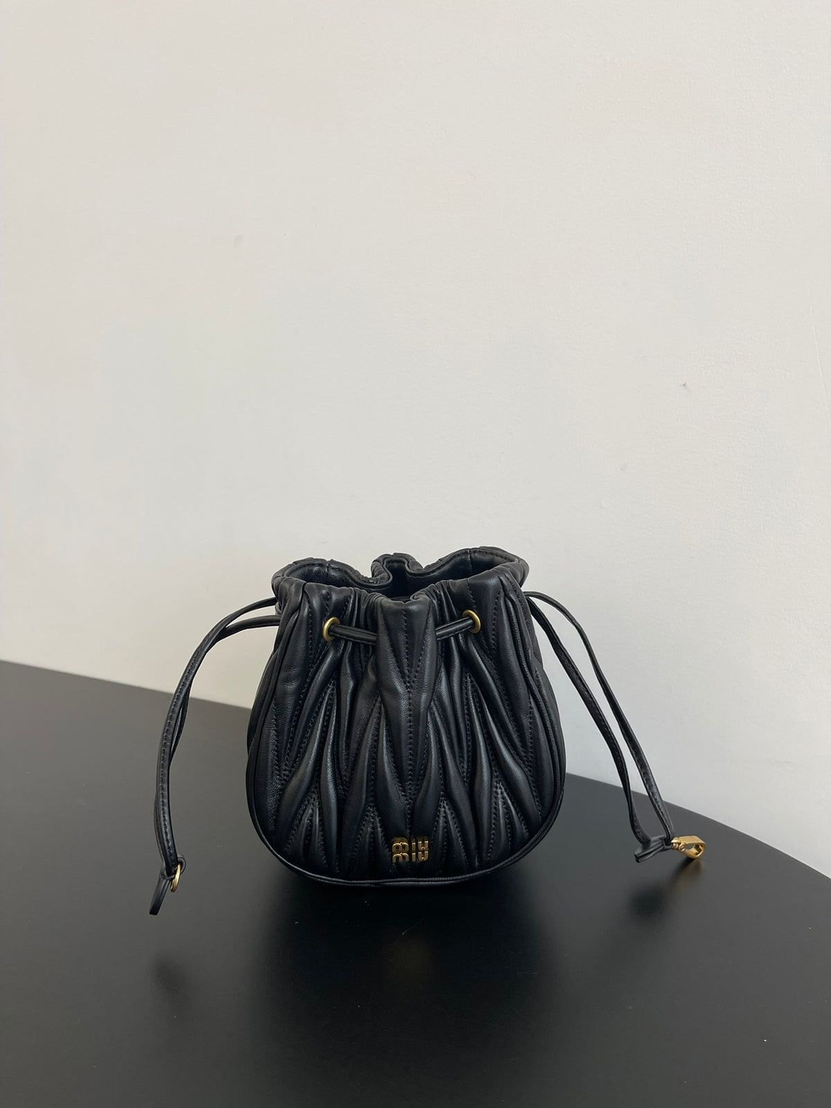 Miu Miu Matelassé Drawstring Mini Bag – Black