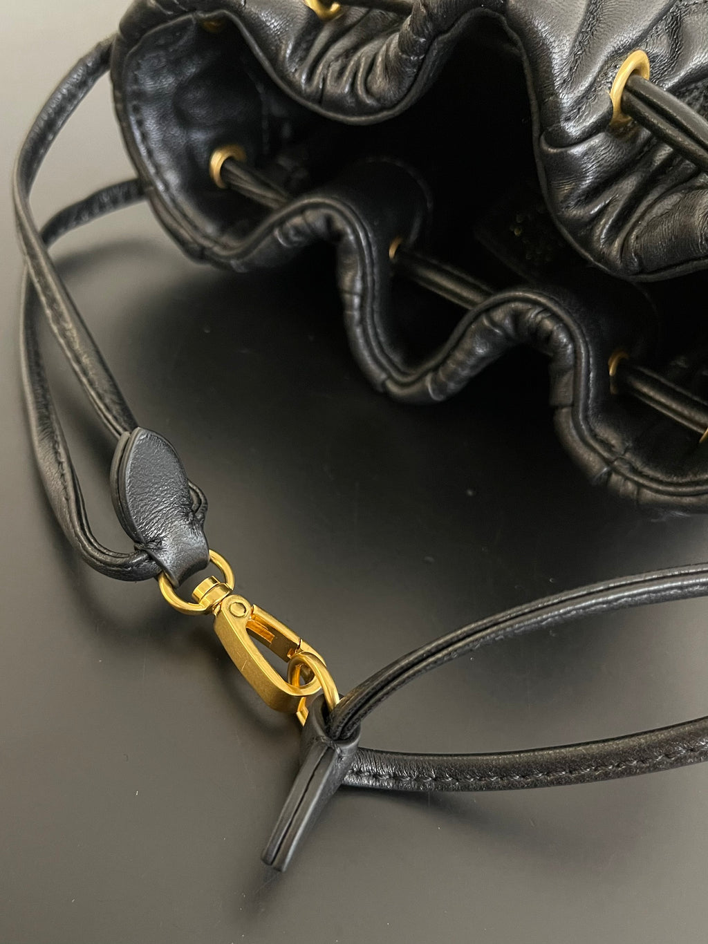 Miu Miu Matelassé Drawstring Mini Bag – Black