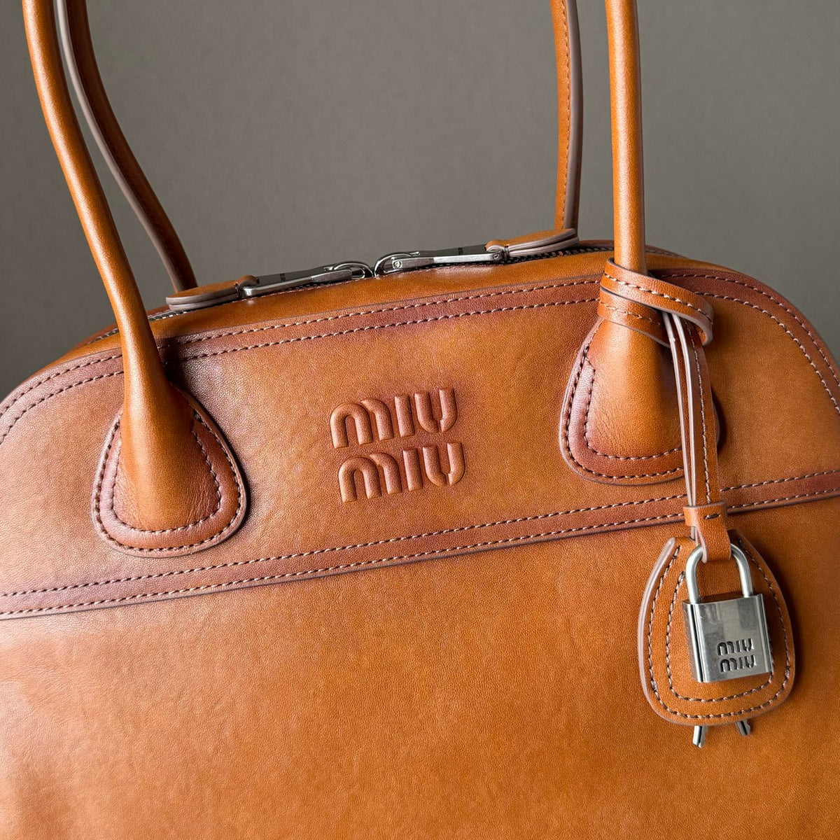 Miu Miu Aventure Leather Top Handle Bag – Cognac