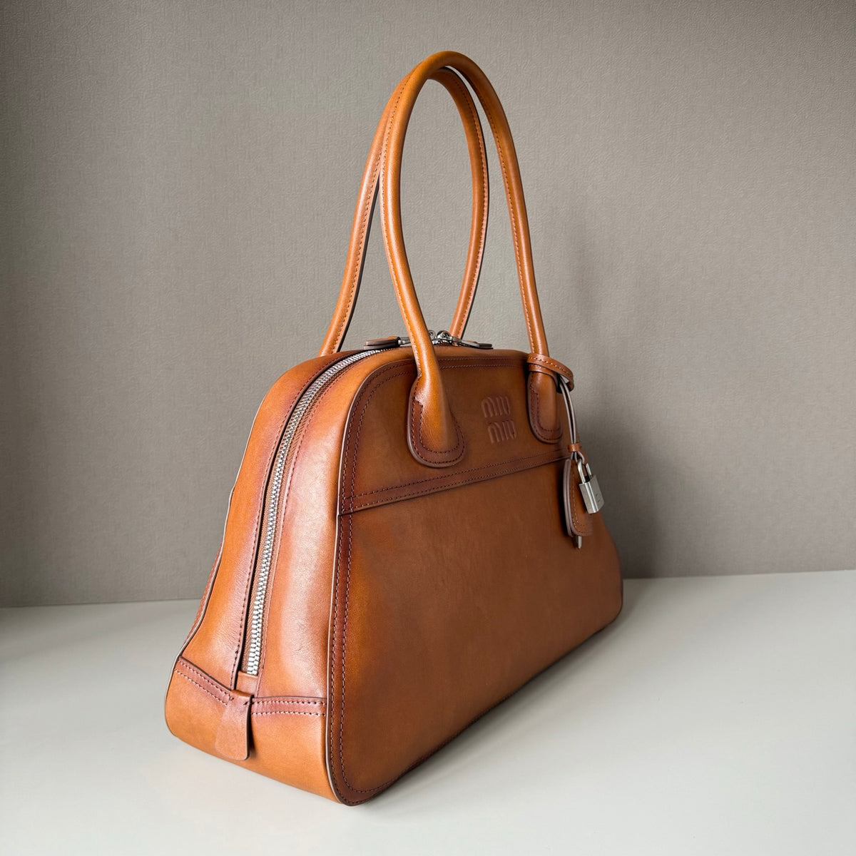 Miu Miu Aventure Leather Top Handle Bag – Cognac